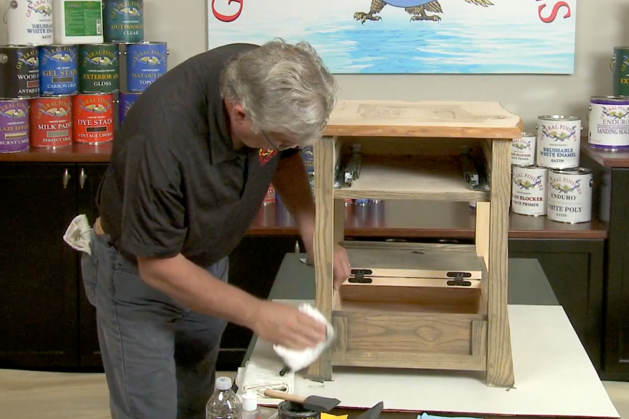 General Finishes’ pro Tom Monahan refinishing furniture.
